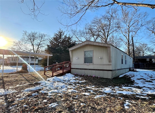 view of snow covered property