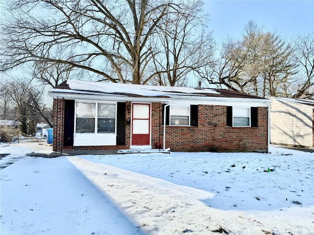 ranch-style house with brick siding