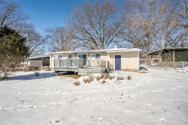 view of front of house with a wooden deck