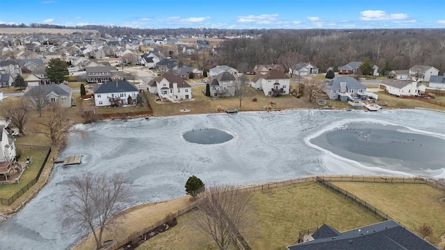 birds eye view of property with a residential view