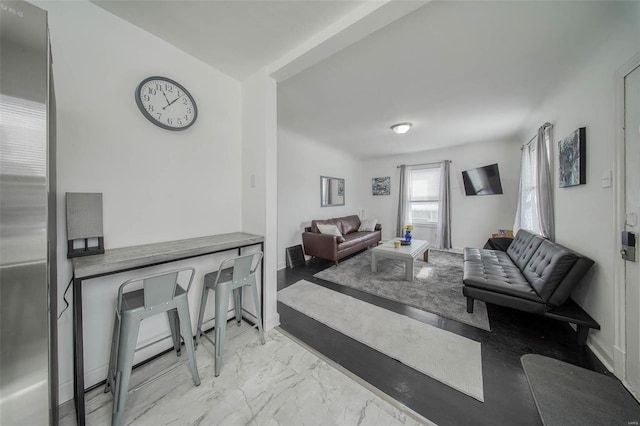 living room featuring marble finish floor