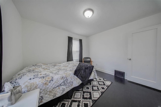 bedroom featuring baseboards