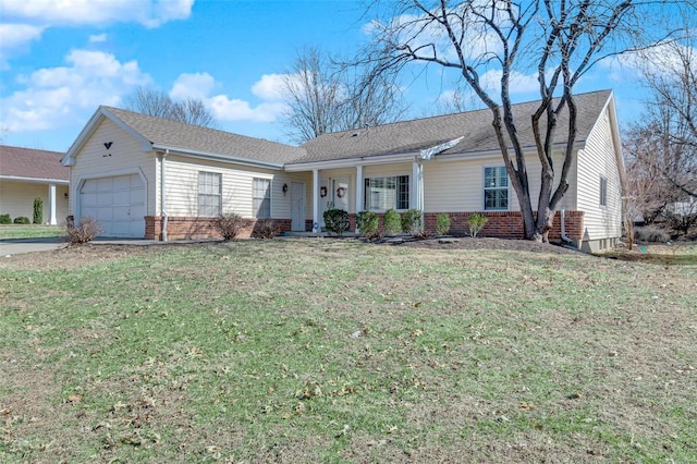 single story home featuring a garage, driveway, brick siding, and a front yard