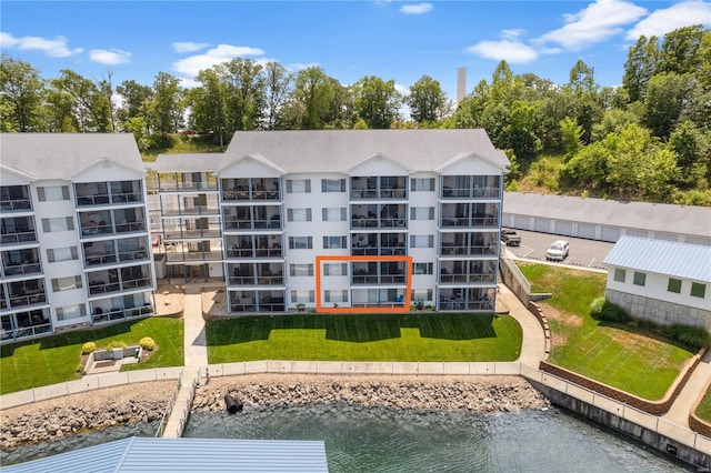 view of building exterior with a water view