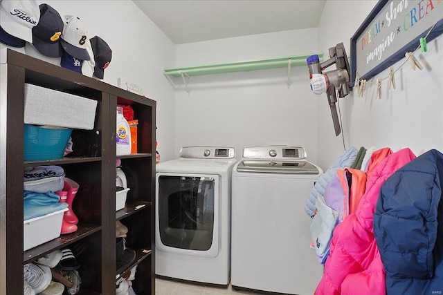 clothes washing area with laundry area and washing machine and dryer