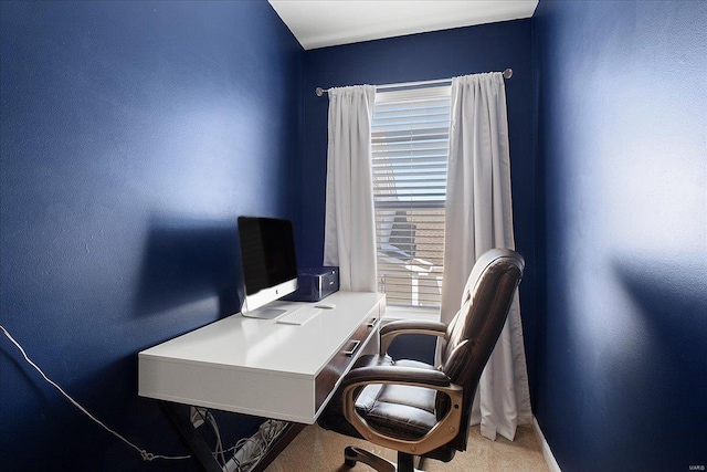 office with carpet floors and baseboards