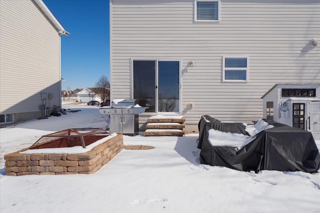 view of snow covered property