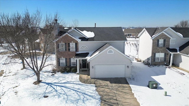 traditional-style home with a residential view, concrete driveway, and a chimney