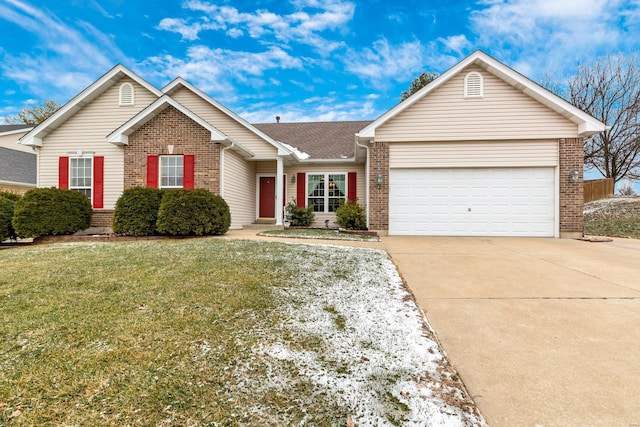 ranch-style home with a garage and a front lawn