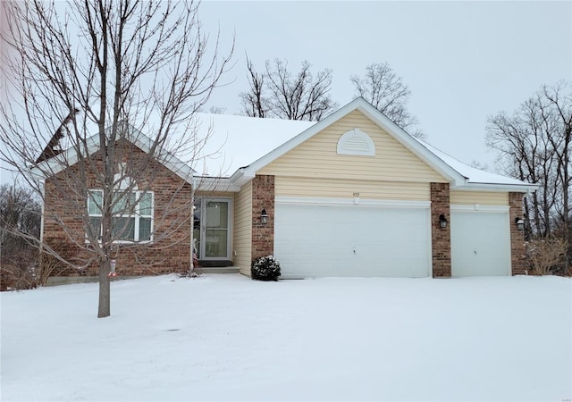 single story home with a garage