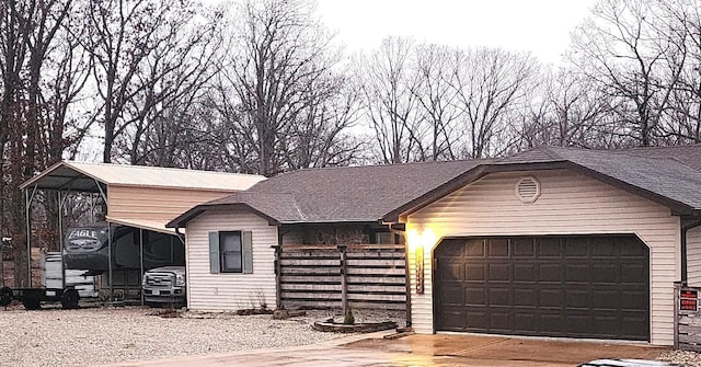 view of front of house with a garage and concrete driveway