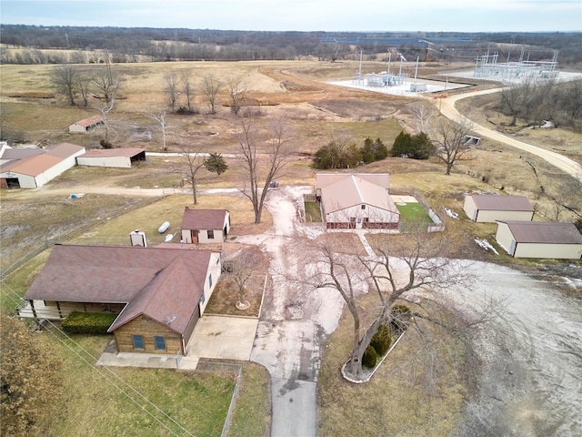 birds eye view of property featuring a rural view