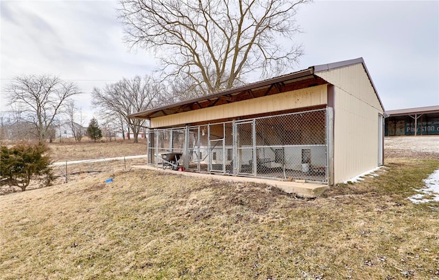 view of outbuilding with an outbuilding and an exterior structure