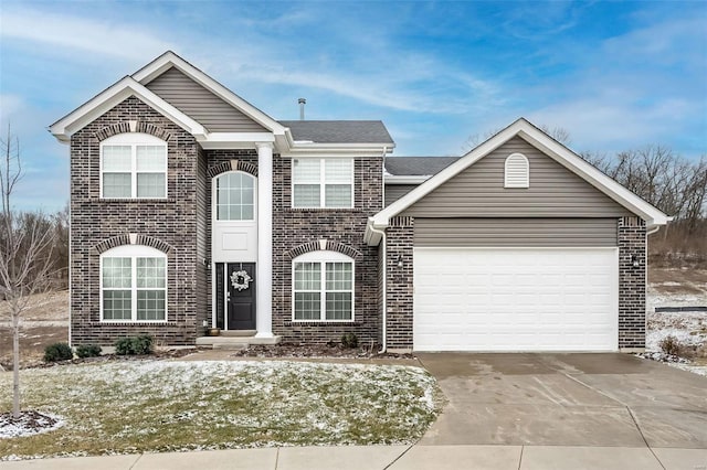 traditional home with driveway, brick siding, roof with shingles, and an attached garage