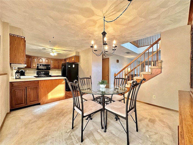 dining area with stairs, ceiling fan with notable chandelier, light carpet, and baseboards