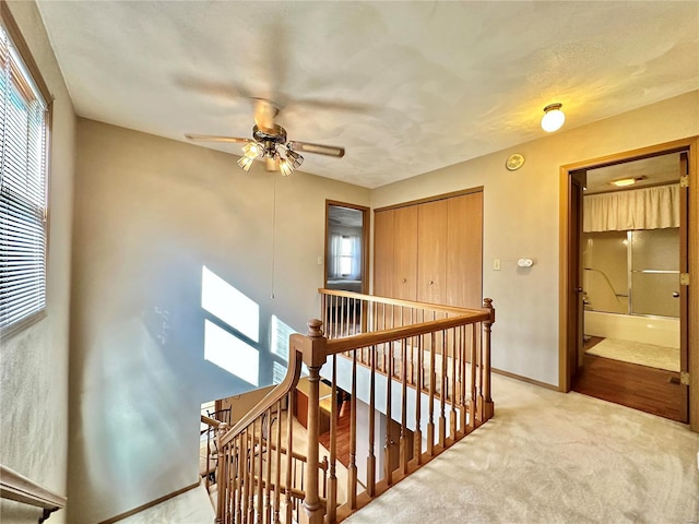 stairs with carpet flooring and baseboards