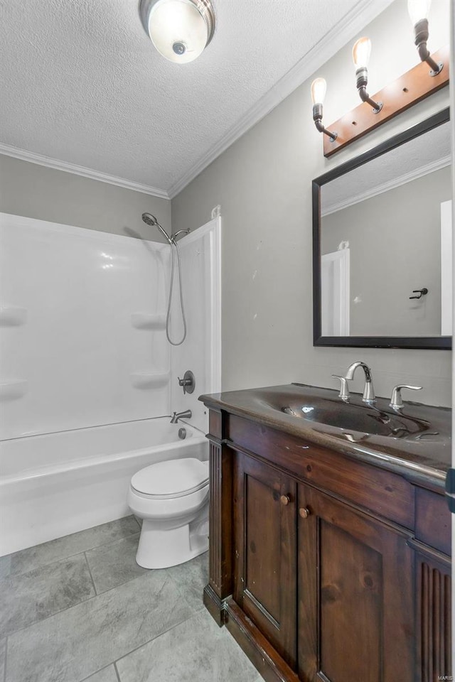 bathroom with a textured ceiling, toilet, vanity, shower / washtub combination, and ornamental molding