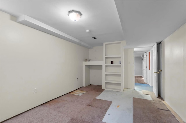 unfurnished bedroom featuring visible vents