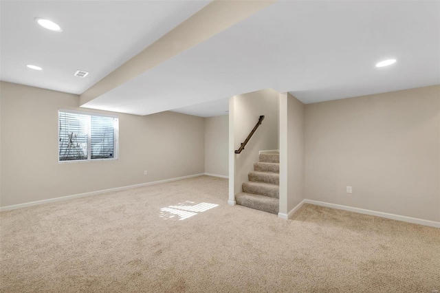 basement featuring visible vents, recessed lighting, stairway, carpet flooring, and baseboards