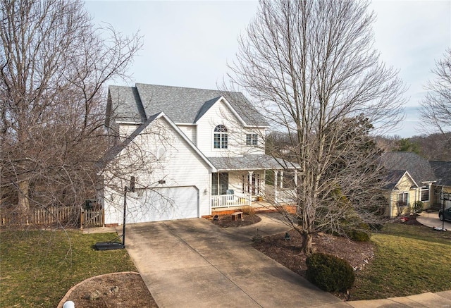 view of front of property featuring a porch, a garage, a shingled roof, driveway, and a front lawn