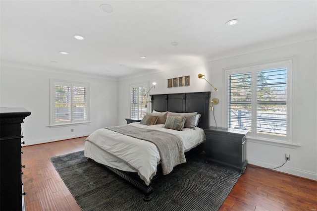 bedroom featuring recessed lighting, baseboards, and wood finished floors