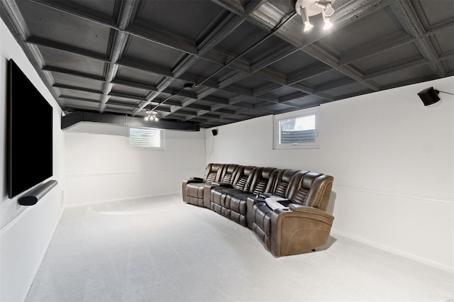 carpeted living area with coffered ceiling, beam ceiling, and baseboards