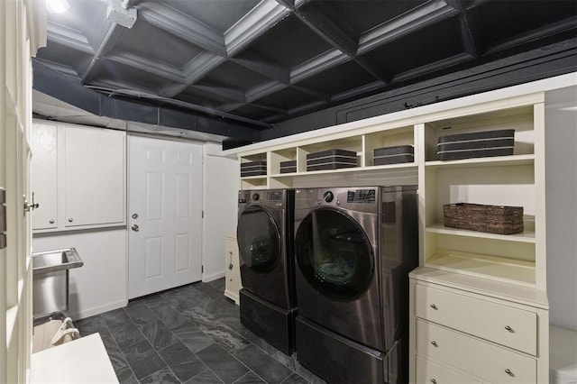 clothes washing area featuring washing machine and dryer and marble finish floor