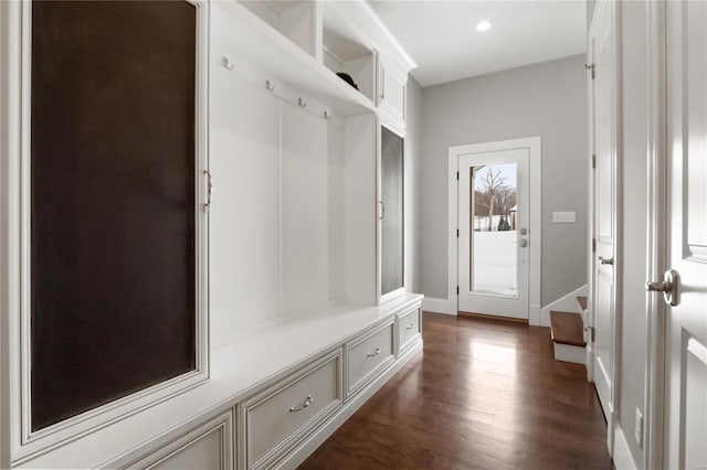 mudroom featuring baseboards, dark wood finished floors, and recessed lighting