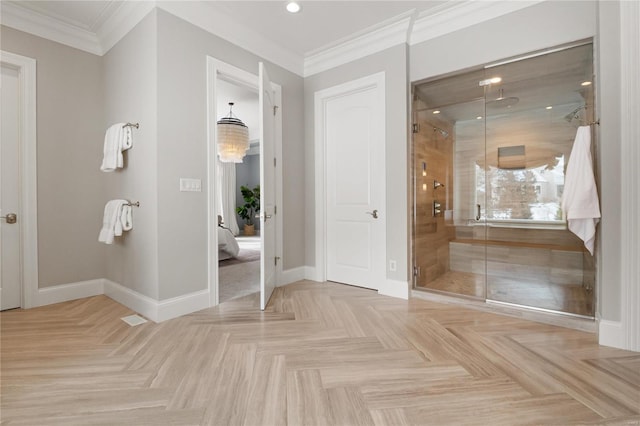 bathroom with a stall shower, crown molding, baseboards, and recessed lighting