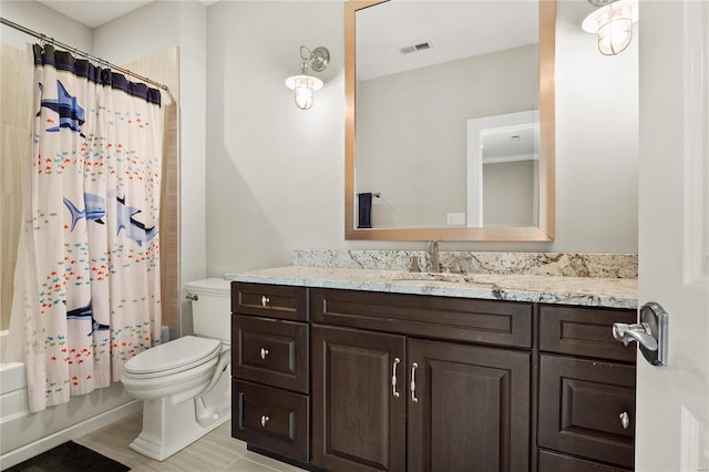 bathroom with toilet, visible vents, shower / bath combo with shower curtain, and vanity