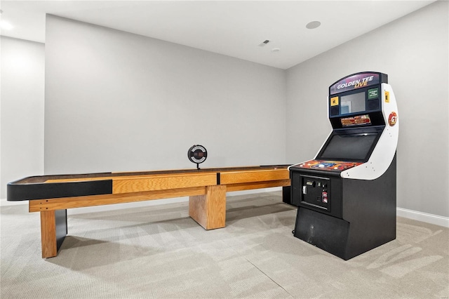 game room featuring carpet and baseboards