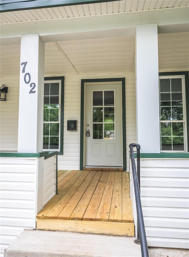 entrance to property with a porch