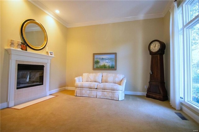 unfurnished living room featuring light carpet, a fireplace, visible vents, and ornamental molding