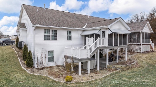 back of house featuring stairs, a shingled roof, cooling unit, and a sunroom