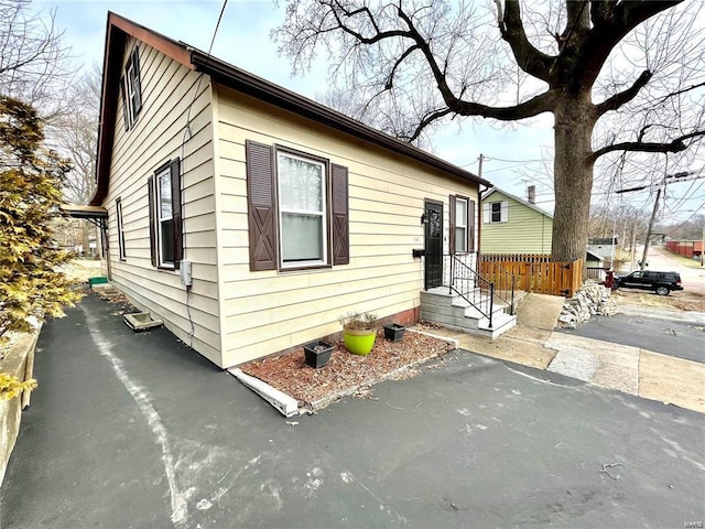 view of front of property with fence