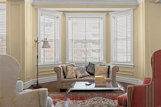 living room featuring baseboards and wood finished floors