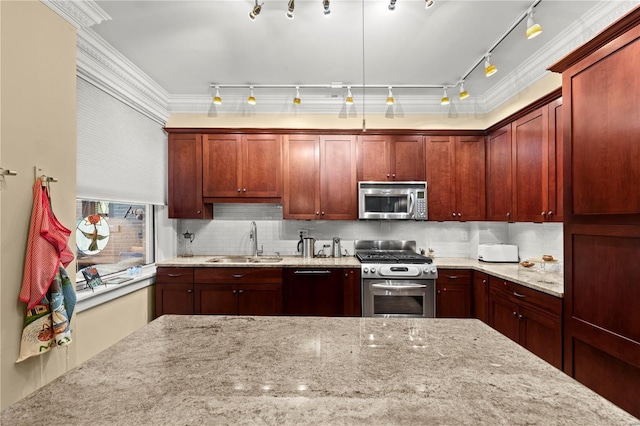 kitchen with appliances with stainless steel finishes, light stone counters, ornamental molding, a sink, and backsplash