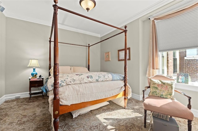 bedroom featuring baseboards and ornamental molding