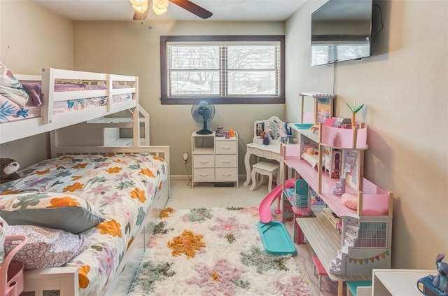 bedroom featuring carpet and baseboards