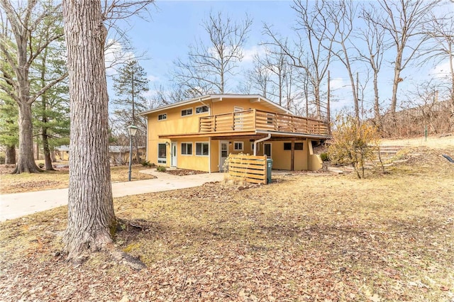 view of front of house featuring a wooden deck