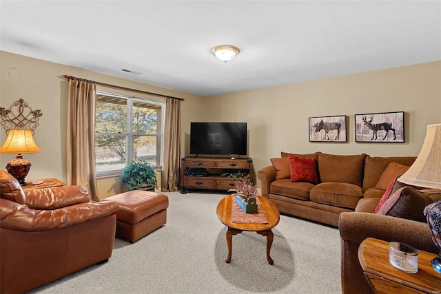 carpeted living room featuring visible vents