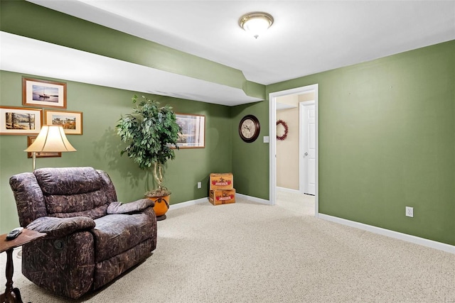 living area with carpet floors and baseboards