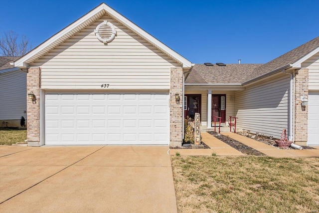 single story home featuring a garage, brick siding, driveway, and a shingled roof