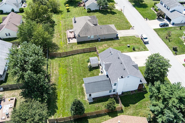 birds eye view of property with a residential view