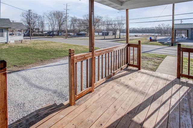 deck featuring a lawn