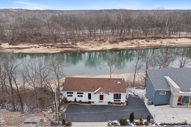 birds eye view of property with a water view