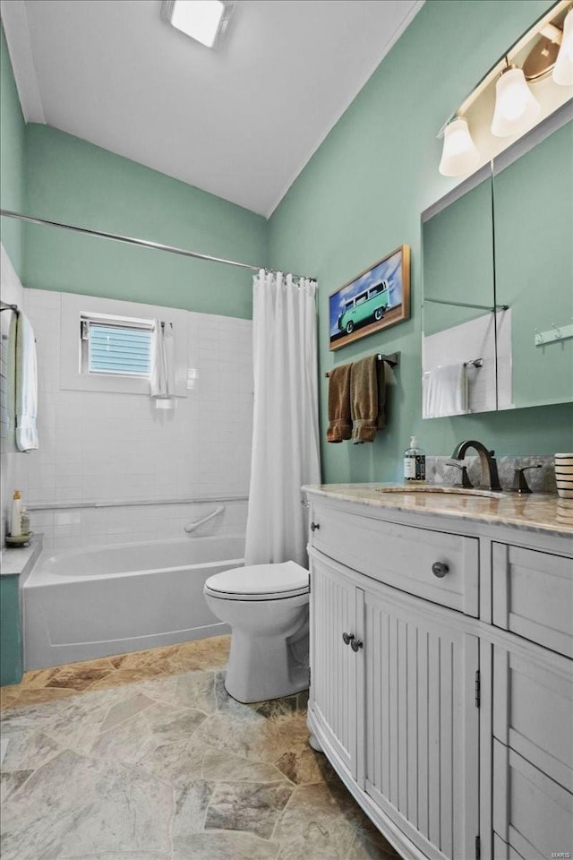 full bath with toilet, shower / tub combo, and vanity