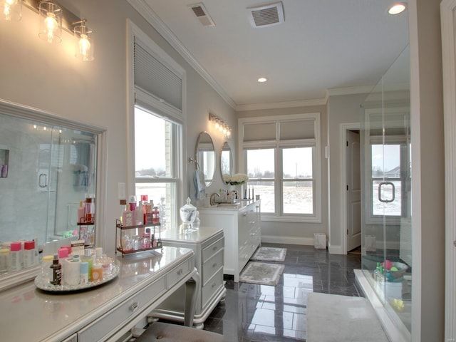 bathroom featuring a wealth of natural light, visible vents, and crown molding