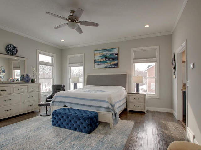 bedroom with dark wood-style floors, multiple windows, ornamental molding, and baseboards