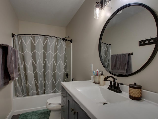 bathroom featuring toilet, shower / bath combination with curtain, and vanity